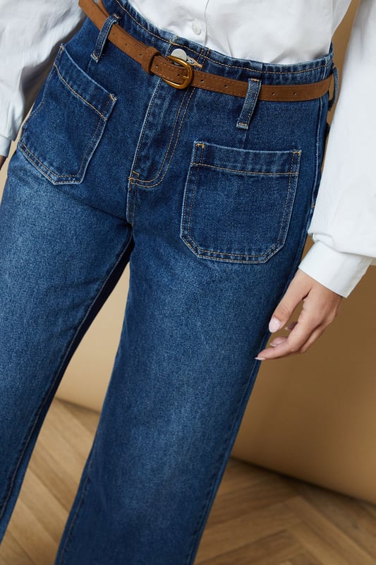 Cropped straight-leg design for a modern silhouette
        Belted waist detail adds a stylish touch
        Front patch pockets for a utilitarian-inspired look
        High-rise fit flatters the waistline
        Versatile wash suitable for various casual outfits
    
    These belted cropped straight jeans from Oasis offer a fresh take on classic denim. The high-rise fit and straight-leg cut create a flattering silhouette, while the cropped length adds a contemporary edge. Perfect for casual daywear, these jeans can be styled effortlessly for various occasions. Pair them with a crisp white shirt and sandals for a relaxed weekend look, or dress them up with a floral blouse and ankle boots for a family gathering. The front patch pockets and belted waist detail give these jeans a utilitarian-inspired charm, making them a versatile addition to your wardrobe. For a trendy double denim ensemble, team them with an oversized denim shirt as seen on the model. These jeans are ideal for those seeking a balance between comfort and style in their everyday attire.