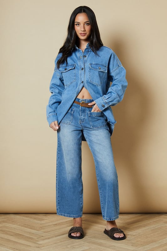 Cropped straight-leg design for a modern silhouette
        Belted waist detail adds a stylish touch
        Front patch pockets for a utilitarian-inspired look
        High-rise fit flatters the waistline
        Versatile wash suitable for various casual outfits
    
    These belted cropped straight jeans from Oasis offer a fresh take on classic denim. The high-rise fit and straight-leg cut create a flattering silhouette, while the cropped length adds a contemporary edge. Perfect for casual daywear, these jeans can be styled effortlessly for various occasions. Pair them with a crisp white shirt and sandals for a relaxed weekend look, or dress them up with a floral blouse and ankle boots for a family gathering. The front patch pockets and belted waist detail give these jeans a utilitarian-inspired charm, making them a versatile addition to your wardrobe. For a trendy double denim ensemble, team them with an oversized denim shirt as seen on the model. These jeans are ideal for those seeking a balance between comfort and style in their everyday attire.