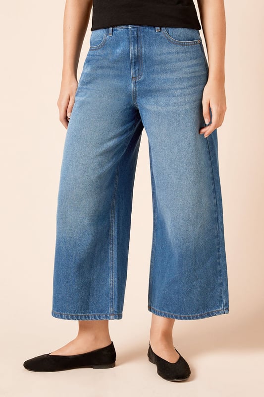 Trendy culotte-style jeans for a modern silhouette
        High-waisted design for a flattering fit
        Wide-leg cut for comfort and style
        Classic five-pocket styling
        Cropped length perfect for showcasing footwear
    
    Embrace effortless chic with these denim culotte jeans from Dorothy Perkins. The high-waisted design and wide-leg cut create a fashionable silhouette that's both comfortable and on-trend. Perfect for the woman who loves to stay current without compromising on comfort, these jeans are ideal for a variety of casual occasions. Style them with a tucked-in blouse and blazer for a smart-casual brunch with friends, or pair with a cosy jumper for a relaxed family gathering. The cropped length is perfect for showing off your favourite flats or trainers, making these jeans a versatile addition to your wardrobe. Easy to dress up or down, they're sure to become a go-to piece for your everyday style, offering that perfect balance of fashion-forward design and practical comfort that Dorothy Perkins is known for.
