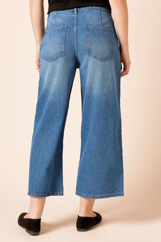 Trendy culotte-style jeans for a modern silhouette
        High-waisted design for a flattering fit
        Wide-leg cut for comfort and style
        Classic five-pocket styling
        Cropped length perfect for showcasing footwear
    
    Embrace effortless chic with these denim culotte jeans from Dorothy Perkins. The high-waisted design and wide-leg cut create a fashionable silhouette that's both comfortable and on-trend. Perfect for the woman who loves to stay current without compromising on comfort, these jeans are ideal for a variety of casual occasions. Style them with a tucked-in blouse and blazer for a smart-casual brunch with friends, or pair with a cosy jumper for a relaxed family gathering. The cropped length is perfect for showing off your favourite flats or trainers, making these jeans a versatile addition to your wardrobe. Easy to dress up or down, they're sure to become a go-to piece for your everyday style, offering that perfect balance of fashion-forward design and practical comfort that Dorothy Perkins is known for.