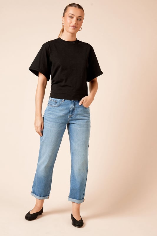 Relaxed boyfriend fit for effortless style
        Ankle-grazer length with fold-up cuffs
        Classic five-pocket design
        Versatile mid-wash denim
        Belt loops for accessorising options
    
    Embrace laid-back chic with these Dorothy Perkins Boyfriend Ankle Grazer Fold Up Jeans. The relaxed fit offers comfort without compromising on style, perfect for the fashion-conscious woman who values both trends and ease. The ankle-grazer length with fold-up cuffs adds a contemporary twist, allowing you to customise your look. Pair with a crisp white tee and trainers for a casual brunch date, or dress up with a flowy blouse and ballet flats for a baby shower. The versatile mid-wash denim effortlessly transitions from day to night, making these jeans a wardrobe staple. Whether you're running errands or meeting friends for coffee, these jeans offer the perfect blend of comfort and style for the modern woman who's always on the go.