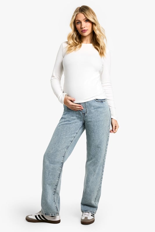 Relaxed boyfriend-style fit for ultimate comfort
        High-waisted design with stretchy over-bump panel
        Classic five-pocket styling
        Versatile light wash denim
        Full-length legs with a straight cut
    
    Embrace laid-back chic with these maternity boyfriend jeans from Boohoo. Perfect for the fashion-forward mum-to-be, these jeans offer a relaxed fit that doesn't compromise on style. The high-waisted design features a stretchy over-bump panel for growing comfort, while the classic five-pocket styling maintains a timeless look. Pair with a fitted white top and trainers for a casual daytime ensemble, or dress them up with a flowing blouse and ankle boots for evening drinks with friends. The versatile light wash denim makes these jeans a wardrobe staple that can effortlessly transition from day to night. Whether you're running errands or meeting for brunch, these jeans provide the perfect blend of comfort and style to accommodate your changing body throughout pregnancy.