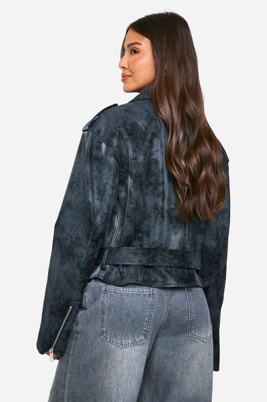 Vintage-inspired biker jacket with a distressed finish
        Asymmetrical zip front for edgy appeal
        Notched lapels and epaulettes for classic biker style
        Multiple zipped pockets for practicality and style
        Adjustable belt at hem for a customisable fit
    
    Channel your inner rebel with this vintage-inspired biker jacket from Boohoo. The distressed finish gives it a lived-in look that's perfect for adding edge to any outfit. Pair it with wide-leg jeans and a simple white tee for an effortlessly cool daytime look, or throw it over a floral dress to add some attitude to your evening ensemble. The versatile design makes it suitable for various casual occasions, from coffee dates to gigs. The multiple zipped pockets are not only stylish but practical for keeping your essentials close at hand. Whether you're heading to a family gathering or a night out with friends, this jacket will be your go-to for an instant style upgrade. Remember to keep your footwear casual - think trainers or ankle boots - to maintain the relaxed vibe this jacket embodies.
