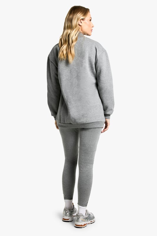 Comfortable cotton-mix fabric for all-day wear
        Bold 'New York' print on the sweatshirt for urban flair
        High-waisted leggings for a flattering silhouette
        Convenient zip detail for easy dressing
        Versatile two-piece set perfect for maternity loungewear
    
    Embrace comfort and style during your pregnancy with this chic maternity leggings set. The soft cotton-mix fabric ensures all-day comfort, while the bold 'New York' print on the sweatshirt adds a touch of urban sophistication. The high-waisted leggings provide gentle support for your growing bump, and the convenient zip detail makes dressing a breeze. Perfect for leisurewear, this versatile set can be styled for various casual outings. Pair with trendy trainers and a denim jacket for a cool mum-to-be look when running errands, or layer with a longline cardigan and slip-on shoes for a cosy day at home. The neutral grey hue allows for easy mixing and matching with your existing wardrobe, making this set a must-have for expectant mums who value both comfort and fashion-forward style.