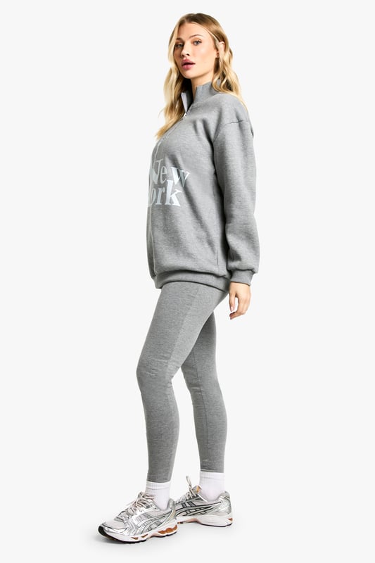 Comfortable cotton-mix fabric for all-day wear
        Bold 'New York' print on the sweatshirt for urban flair
        High-waisted leggings for a flattering silhouette
        Convenient zip detail for easy dressing
        Versatile two-piece set perfect for maternity loungewear
    
    Embrace comfort and style during your pregnancy with this chic maternity leggings set. The soft cotton-mix fabric ensures all-day comfort, while the bold 'New York' print on the sweatshirt adds a touch of urban sophistication. The high-waisted leggings provide gentle support for your growing bump, and the convenient zip detail makes dressing a breeze. Perfect for leisurewear, this versatile set can be styled for various casual outings. Pair with trendy trainers and a denim jacket for a cool mum-to-be look when running errands, or layer with a longline cardigan and slip-on shoes for a cosy day at home. The neutral grey hue allows for easy mixing and matching with your existing wardrobe, making this set a must-have for expectant mums who value both comfort and fashion-forward style.