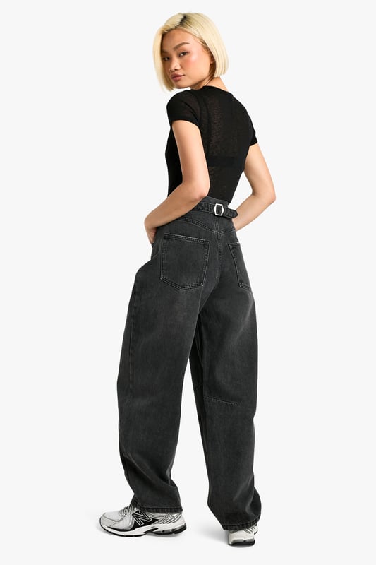 Tapered fit for a modern silhouette
        Distinctive seam detailing adds visual interest
        High-rise waist with belt loops for versatile styling
        Rigid denim construction for a structured look
        Wide-leg design for a relaxed, on-trend appearance
    
    Make a bold statement with these eye-catching tapered jeans from Boohoo. The unique seam detailing sets these trousers apart, offering a contemporary twist on a classic wardrobe staple. Perfect for the fashion-forward woman who values both style and comfort, these jeans can effortlessly transition from day to night. Pair them with a cropped tee and trainers for a casual daytime look, or dress them up with a fitted bodysuit and heels for an evening out. The high-rise waist and wide-leg silhouette create a flattering shape that complements various body types. Whether you're heading to a family gathering or meeting friends for coffee, these jeans provide the ideal blend of comfort and style. Embrace the latest trends while maintaining your individual flair with these versatile and striking denim trousers.