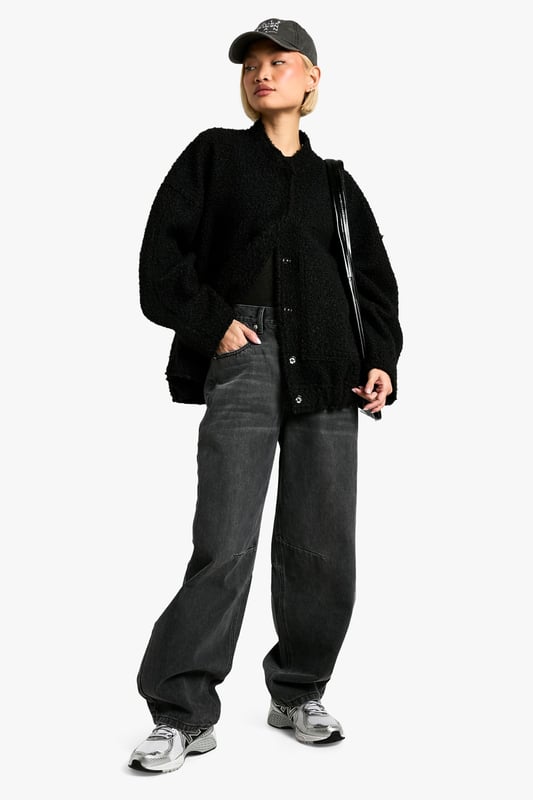 Tapered fit for a modern silhouette
        Distinctive seam detailing adds visual interest
        High-rise waist with belt loops for versatile styling
        Rigid denim construction for a structured look
        Wide-leg design for a relaxed, on-trend appearance
    
    Make a bold statement with these eye-catching tapered jeans from Boohoo. The unique seam detailing sets these trousers apart, offering a contemporary twist on a classic wardrobe staple. Perfect for the fashion-forward woman who values both style and comfort, these jeans can effortlessly transition from day to night. Pair them with a cropped tee and trainers for a casual daytime look, or dress them up with a fitted bodysuit and heels for an evening out. The high-rise waist and wide-leg silhouette create a flattering shape that complements various body types. Whether you're heading to a family gathering or meeting friends for coffee, these jeans provide the ideal blend of comfort and style. Embrace the latest trends while maintaining your individual flair with these versatile and striking denim trousers.