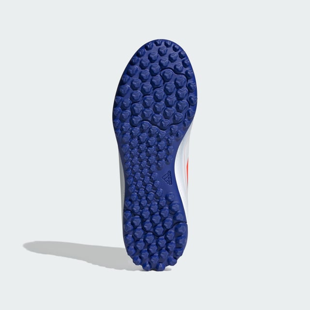 Free the fast with the adidas F50. Created to unlock the full potential of your acceleration, movement and speed. These juniors' adidas Club soccer cleats keep you comfortable with a textured synthetic upper and perforated tongue. Underneath, a lug rubber outsole ensures you stay ahead of the competition on artificial turf courts.  - Regular fit - Lace closure - Textured synthetic upper - Textile lining - Breathable perforated tongue - Rubber outsole for artificial turf  Shipped by adidas