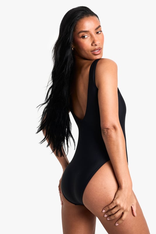 Sleek square neckline for a modern twist
        Shaping design to enhance your silhouette
        High-cut leg for elongated appearance
        Wide, comfortable straps for added support
        Versatile one-piece suitable for various beach activities
    
    Make a splash this season with our Shaping Essentials swimsuit. This chic one-piece radiates confidence and style, perfect for your next beach getaway or poolside lounge. The square neckline adds a contemporary edge, while the high-cut leg design creates the illusion of longer, leaner legs. Crafted with a shaping fabric, it smooths and sculpts your figure in all the right places, ensuring you feel your best whether you're taking a dip or soaking up the sun. The wide straps offer comfort and support for all-day wear, making it ideal for everything from leisurely swims to beach volleyball. Pair with oversized sunglasses and a wide-brimmed hat for ultimate seaside glamour, or throw on a breezy kaftan and sandals for a stylish transition from beach to bar. This versatile swimsuit is a must-have for any summer wardrobe, promising to be your go-to for countless sunny days ahead.
