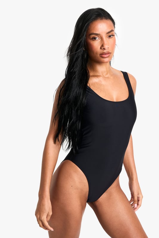 Sleek square neckline for a modern twist
        Shaping design to enhance your silhouette
        High-cut leg for elongated appearance
        Wide, comfortable straps for added support
        Versatile one-piece suitable for various beach activities
    
    Make a splash this season with our Shaping Essentials swimsuit. This chic one-piece radiates confidence and style, perfect for your next beach getaway or poolside lounge. The square neckline adds a contemporary edge, while the high-cut leg design creates the illusion of longer, leaner legs. Crafted with a shaping fabric, it smooths and sculpts your figure in all the right places, ensuring you feel your best whether you're taking a dip or soaking up the sun. The wide straps offer comfort and support for all-day wear, making it ideal for everything from leisurely swims to beach volleyball. Pair with oversized sunglasses and a wide-brimmed hat for ultimate seaside glamour, or throw on a breezy kaftan and sandals for a stylish transition from beach to bar. This versatile swimsuit is a must-have for any summer wardrobe, promising to be your go-to for countless sunny days ahead.