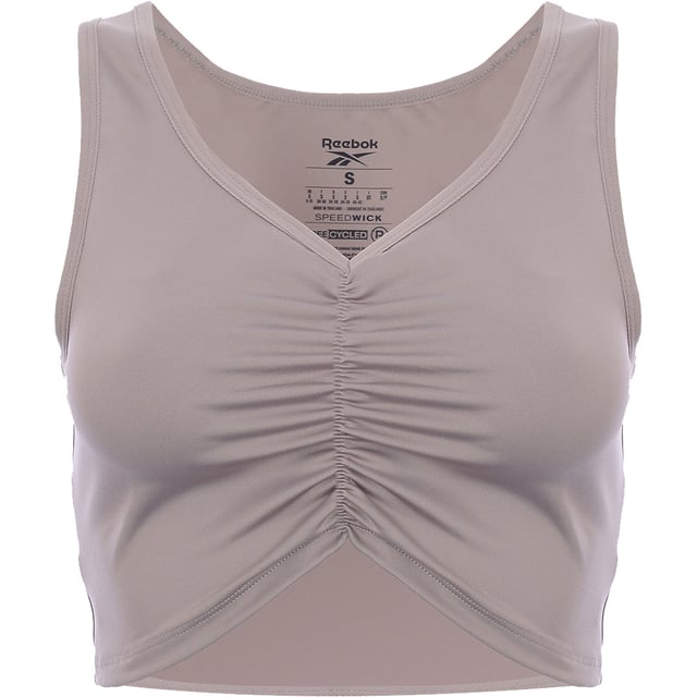 Reebok Cropped Top: Made of 85% Polyester and 15% Elastane. It features a V-neck, ruched front, Reebok logo print on the reverse, cropped length, and slim fit.