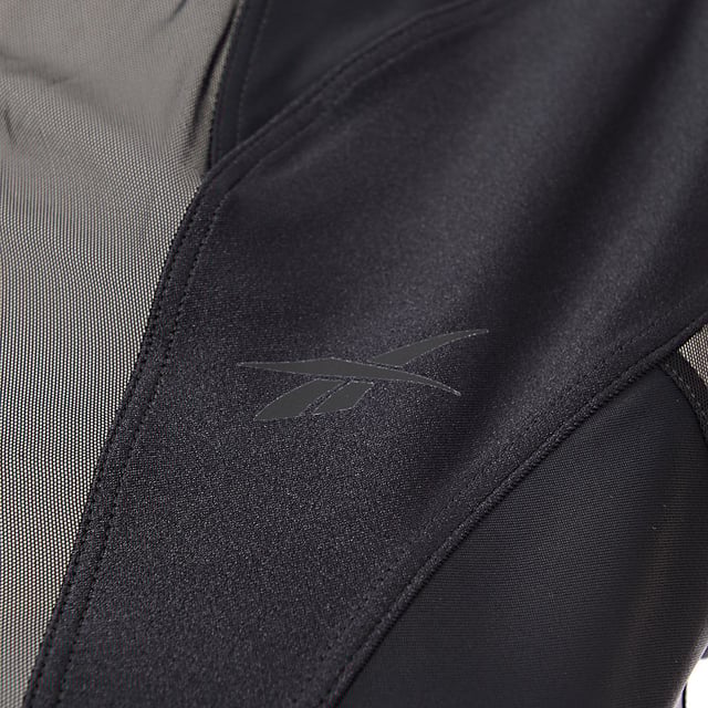 80% Polyamide, 20% Elastane Reebok's Butterfly sports bra panels mesh and stretch jersey fabric to aid breathability and movement