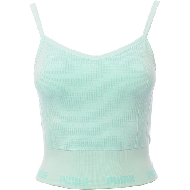 Main: 94% Nylon, Main: 6% Elastane. The Puma Training Evoknit seamless sports bra in aqua is a stylish and functional piece of activewear, perfect for light-impact activities. Its seamless design reduces friction, ensuring comfort during workouts, while the thin straps and Puma logo on the back add a touch of sporty elegance. The stretchy underband provides a secure fit, making it a great choice for those who value both performance and fashion in their gym wardrobe.