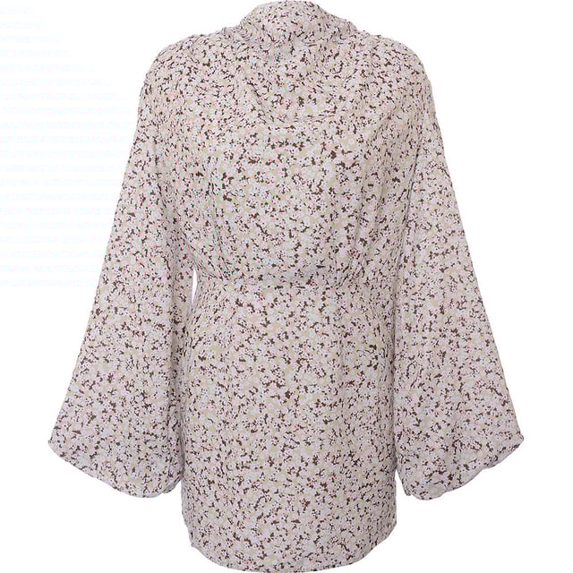 Main: 100% Polyester. The Pretty Lavish balloon sleeve satin mini dress in a spring floral pattern captures the essence of the season with its vibrant and airy design. Its luxurious satin fabric glides effortlessly, reflecting the warm glow of the sun, while the balloon sleeves add a touch of whimsy and elegance. Perfect for garden parties or sunny strolls, this dress is a celebration of the freshness and joy that come with summer days. It's a piece that promises to turn heads and uplift spirits with its delightful fusion of comfort and chic style.