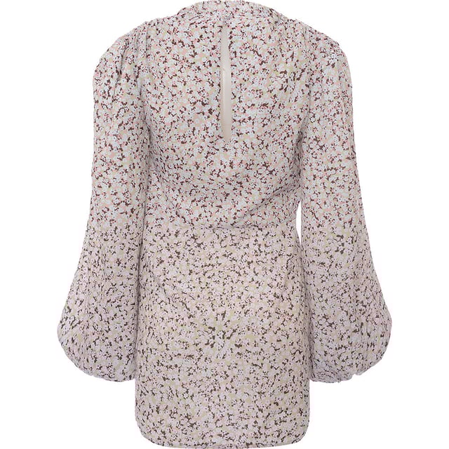 Main: 100% Polyester. The Pretty Lavish balloon sleeve satin mini dress in a spring floral pattern captures the essence of the season with its vibrant and airy design. Its luxurious satin fabric glides effortlessly, reflecting the warm glow of the sun, while the balloon sleeves add a touch of whimsy and elegance. Perfect for garden parties or sunny strolls, this dress is a celebration of the freshness and joy that come with summer days. It's a piece that promises to turn heads and uplift spirits with its delightful fusion of comfort and chic style.