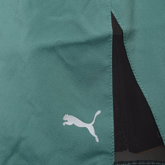Reflective Polyester Shorts: This item is made of 100% Polyester. It has an elasticated waist, zip back pocket, 360 degrees of reflectivity for increased visibility in low lighting, stretchy side panels for a greater range of movement, regular fit, and is true to size.