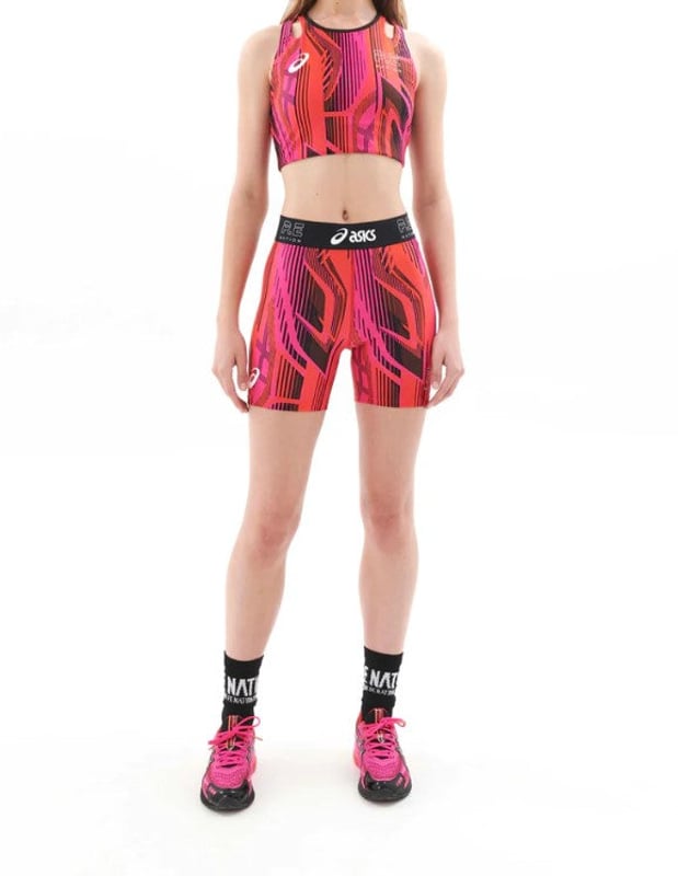 76% RECYCLED POLYESTER &amp; 24% ELASTANE. High rise 5" active bike short. Squat proof, recycled matte fabrication. P.E Nation &amp; ASICS Silicon printed elastic waistband