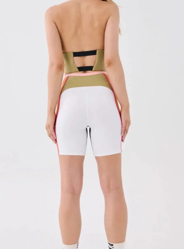 60% polyester &amp; 40% elastane. Sitting high on the waist with a 7â€ length for a comfortable and wearable fit. Completed with an understated P.E Nation logo patch at the hem