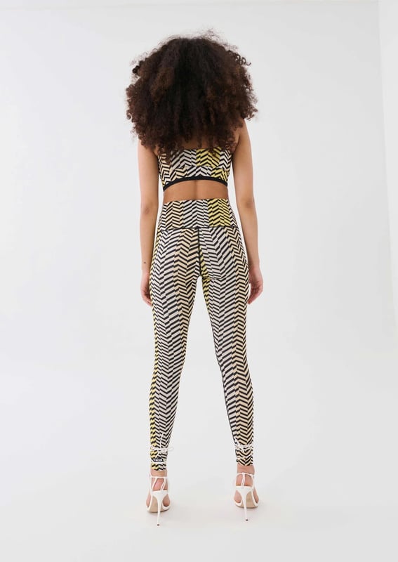 80% Bamboo Viscose &amp; 20% Elastane. High rise, full length fashion legging. Wide, self lined waistband. P.E Nation logo patch at ankle
