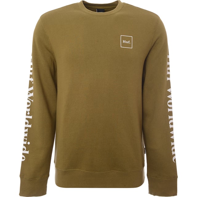 Fabric: 20% Polyester, Fabric: 80% Cotton. The HUF Essentials Domestic Sweatshirt in green is a stylish and comfortable choice for anyone looking to add a touch of casual cool to their wardrobe. Made from a soft cotton-poly blend, it features bold white branding running down the arm, adding a distinctive touch to the design. The sweatshirt also boasts a subtle logo on the left chest, complemented by cuffed sleeves that ensure a snug fit. It's a perfect blend of comfort and streetwise style, ideal for those who appreciate laid-back looks with a hint of skate culture influence.