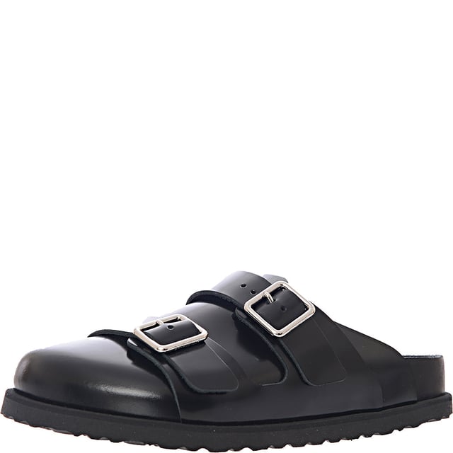 Upper and sole Material Leather. Introducing the Birkenstock 1774 - 222 West Leather Double Buckle Slip On, a stylish and comfortable pair of sandals perfect for both men and women. Made with high-quality leather material, these sandals are built to last and provide optimal comfort for your feet. The slip-on design makes them easy to wear and take off, while the double buckle ensures a secure fit.