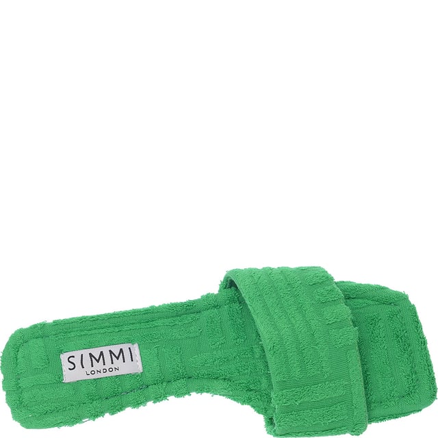 These slip-on shoes are made of textile with a textile lining and rubber sole, featuring an open toe and flat sole.