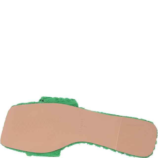 These slip-on shoes are made of textile with a textile lining and rubber sole, featuring an open toe and flat sole.