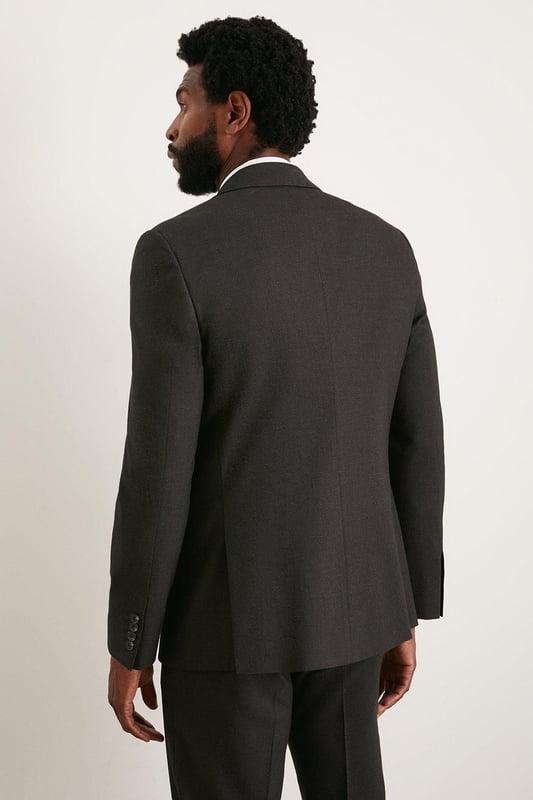 Introducing our Slim Fit Essential Smart Jacket, perfect for any occasion. The back vent allows for ease of movement and added comfort. Whether you're dressing up for a formal event or adding a touch of sophistication to your everyday look, our Slim Fit Essential Jacket is the perfect choice.