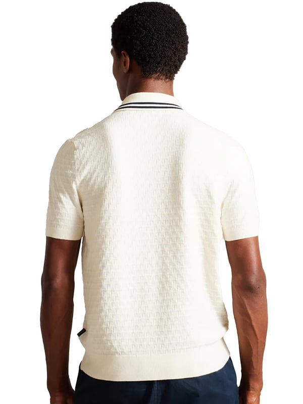 Elevate your everyday wardrobe with the MAHANA polo shirt, designed for effortless style and all-day comfort. Crafted from a premium wool blend, this polo offers a soft feel with a refined textured stitch for added sophistication. The classic button placket and short-sleeved design make it a versatile choice for both smart and casual occasions. Featuring a stylish striped collar, this polo blends traditional charm with modern detailing