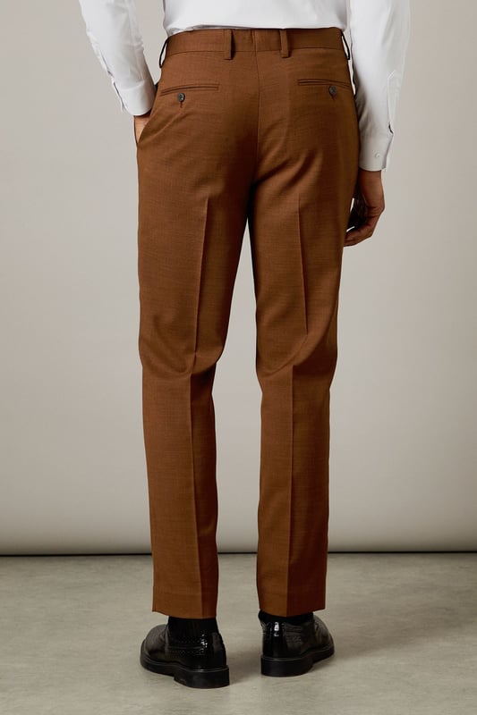 Slim fit design for a modern, tailored silhouette
        Versatile twill fabric with a subtle sheen
        Belt loops for accessorising
        Crisp centre creases for a polished look
        Rear welt pockets for a sleek finish
    
    These Burton slim fit suit trousers are the perfect foundation for your smart wardrobe. The tailored silhouette offers a contemporary edge while maintaining a classic appeal. Crafted from a twill fabric, they provide comfort and durability for all-day wear. Style these trousers with a crisp white shirt and polished Oxfords for a sophisticated office ensemble. For smart-casual events, pair them with a fine-knit jumper and leather trainers. The versatile design makes them suitable for various occasions, from important business meetings to after-work drinks with colleagues. Add a matching jacket for a complete suit look, or mix and match with other pieces to create unique outfits. These trousers are a staple for the modern gentleman who appreciates timeless style with a refined twist.