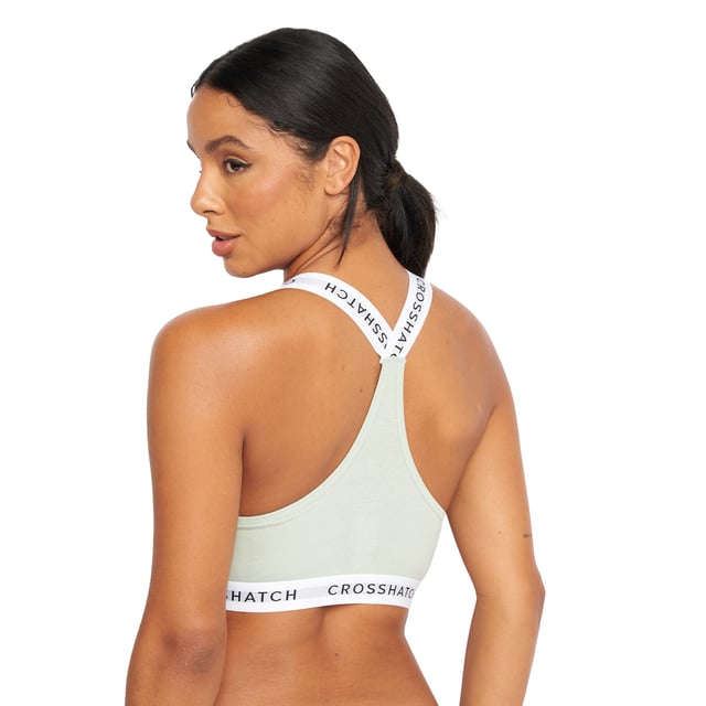 95% Cotton, 5% Elastane. Design: Logo. Branded Strap, Cropped, Non-Padded. Back Style: Racerback. Hem: Branded. Neckline: Scoop.