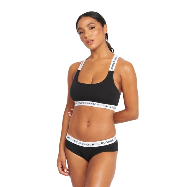 95% Cotton, 5% Elastane. Design: Logo. Branded Strap, Cropped, Non-Padded. Back Style: Racerback. Hem: Branded. Neckline: Scoop.