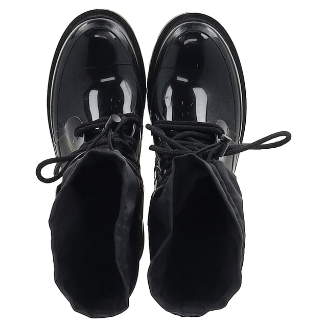 VINTAGE, RRP AS NEW
Step into high-end luxury with the Dior Diorcamp Mid Calf Boots in sleek black rubber. Made in Italy, these boots combine durability with chic sophistication, featuring a glossy rubber finish and premium fabric accents. The versatile design ensures they effortlessly elevate both day and night looks. Whether you're navigating city streets or attending an event, these boots are sure to stand out with their unique fusion of style and function.

with dust bag

Dior Diorcamp Mid Calf Boots in Black Rubber 
Condition: Good
Signs of wear: Minor markings, Used but well maintained. Moderate creasing and marks at surface, wear at soles or replaced soles, scuffing on the sides
Packaging: Dust bag
Color: black
Material: rubber
Size: EU | 41
Measurements: Insole length: 290
SKU: NAPPUGBSH462917W