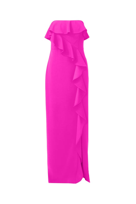 A lovely cascade of ruffles lend feminine charm to this strapless gown. This formal dress features a strapless bodice, column skirt with slit at the side, and ruffle trim that adorns the neckline and drapes elegantly across and down the gown. Crafted from knit crepe fabric with comfortable stretch, this strapless gown will be a showstopper for formal and black-tie affairs. A zipper closure at the center back completes this elegant dress. Styled with gold accessories and a beaded clutch, you are ready for any invite that comes your way.