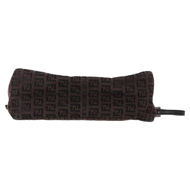 VINTAGE, RRP AS NEW
The Fendi Zucca FF Baguette Shoulder Bag in Brown Canvas is a bold and iconic accessory, featuring the signature FF monogram that gives it a timeless yet contemporary appeal. Crafted from durable canvas, this bag offers both style and functionality with its compact size and versatile shoulder strap. Pair it with a sleek black dress and heels for a sophisticated evening look, or wear it with jeans and a blazer for a chic, everyday ensemble. The warm brown tones of the canvas make it a versatile addition to any wardrobe, effortlessly complementing both casual and formal outfits.

 Fendi Zucca FF Baguette Shoulder Bag in Brown Canvas

Condition: Very good
Signs of wear: No retail tag, Minor sign of wear., Lightly used but very well maintained. Minor creasing, light worn corners, light scratches.
Packaging: Box
Color: Brown | ochre
Material: Canvas 
Size: One Size | One Size
Measurements: Width: 90; Height: 160; Length: 250; Handle drop: 200; Strap length: 470
SKU: NAPPUGBBA463283W
