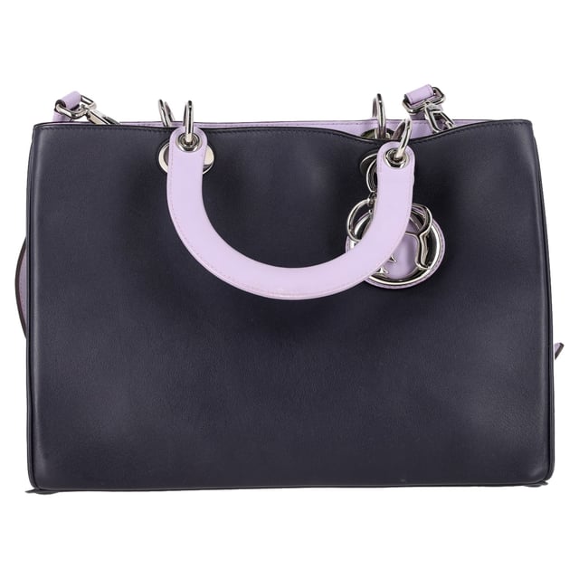 VINTAGE, RRP AS NEW
The Christian Dior Medium Diorissimo Tote Bag in Navy Blue and Silver Calf Leather is a luxurious and timeless accessory, crafted from premium calf leather with a sleek navy blue finish and subtle silver accents. Its spacious interior and structured design make it both practical and elegant, perfect for carrying all your essentials in style. Pair it with a tailored blazer and trousers for a polished, sophisticated look, or carry it with a casual outfit like a cozy sweater and jeans for an elevated everyday vibe. Add simple silver jewelry to complement the bag’s refined detailing and complete your chic ensemble.

Christian Dior Medium Diorissimo Tote Bag in Navy Blue and Silver Leather

Condition: Excellent
Signs of wear: No retail tag, No visible sign of wear., 
Packaging: Dust bag
Color: Blue | navy blue
Material: Leather | calfskin leather
Size: One Size | One Size
Measurements: Width: 120; Height: 230; Length: 310; Handle drop: 380; Strap length: 720
SKU: NAPPUGBBA463492W