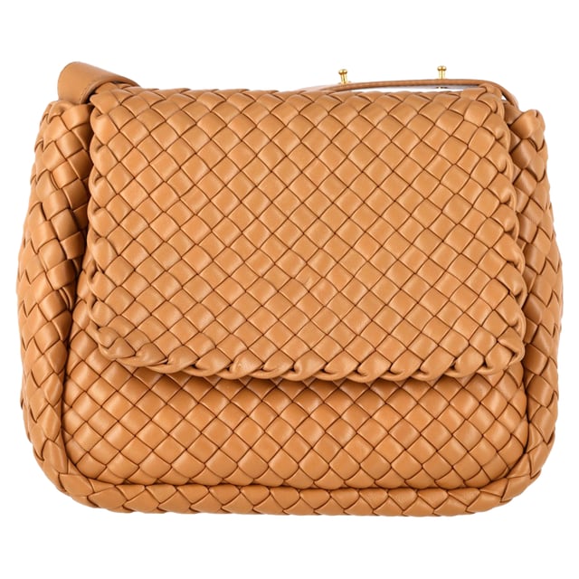 VINTAGE, RRP AS NEW
 The Bottega Veneta Small Cobble Intrecciato Shoulder Bag in Brown Leather is a stunning example of the brand’s signature craftsmanship, featuring the iconic intrecciato weave in rich brown leather for a timeless, luxurious look. Its compact size offers ample space for your essentials, while the adjustable shoulder strap ensures comfort and ease of wear. Pair it with a tailored blazer and jeans for an elevated, everyday look, or carry it with a chic dress for a more polished, evening-ready outfit. The warm brown hue makes this versatile bag a perfect addition to both casual and formal ensembles.

Bottega Veneta Small Cobble Intrecciato Shoulder Bag in Brown Leather

Condition: Excellent
Signs of wear: No retail tag, No visible sign of wear., 
Packaging: Dust bag
Color: Brown | ochre
Material: Leather | lambskin leather
Size: One Size | One Size
Measurements: Width: 80; Height: 220; Length: 260; Handle drop: 390; Strap length: 1020
SKU: NAPPUGBBA463447W