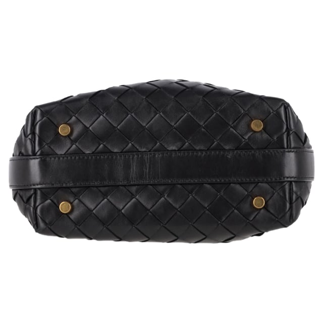 VINTAGE, RRP AS NEW
The Bottega Veneta Wallace Shoulder Bag is a sophisticated piece that exudes the brand's signature craftsmanship. Made from luxurious black calfskin, the bag features the iconic Intrecciato weaving technique, adding a rich texture to its sleek design. The adjustable shoulder strap ensures a perfect fit, while the zippered closure secures your essentials in the spacious main compartment. With its minimalist design and timeless appeal, this bag effortlessly complements any wardrobe.


with Dust bag

Bottega Veneta Wallace Shoulder Bag in Black Leather
Condition: very good
Signs of wear: light marks on interior and exterior
Packaging: Dust bag
Color: black
Material: Leather | calfskin leather
Size: One Size | One Size
Measurements: Width: 270; Height: 170; Length: 250; Handle drop: 270; Strap length: 0
SKU: NAPPUGBBA462459W