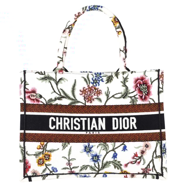 VINTAGE, RRP AS NEW
The Dior Embroidered Medium Rosa Mutabilis Book Tote in multicolor canvas is a vibrant and artistic addition to your accessory collection. Adorned with an intricate floral embroidery design, this tote captures the essence of Dior's commitment to both luxury and craftsmanship. The matching multicolor canvas rolled handles and the iconic CHRISTIAN DIOR logo embroidered across the front bring a refined yet playful touch. With a spacious fabric interior, this tote is as functional as it is stylish, offering plenty of room for your essentials while making a bold fashion statement.



with Dust bag

Dior Embroidered Medium Rosa Mutabilis Book Tote in Multicolor Canvas
Condition: Excellent
Signs of wear: No retail tag, No visible sign of wear., 
Packaging: Dust bag
Color: Multicolor | multicolor
Material: Canvas
Size: One Size | One Size
Measurements: Width: 160; Height: 270; Length: 360; Handle drop: 170; Strap length: 380
SKU: NAPPUGBBA463238W