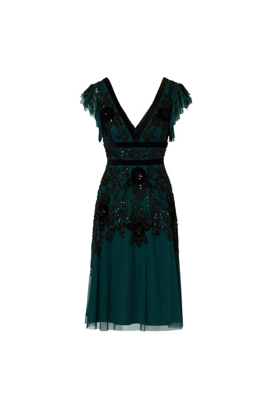 Elevate your evening attire with our stunning midi dress, crafted from an exquisite all-over beaded mesh knit fabric. The V-neckline at both front and back creates a flattering silhouette, complemented by delicate flutter sleeves for a touch of femininity. Velvet trim detailing at the neckline and waist adds luxurious contrast, while the zipper closure at the centre back ensures a seamless fit. Perfect for formal occasions or special events, this dress effortlessly combines elegance and allure, making it a standout choice for any sophisticated affair.