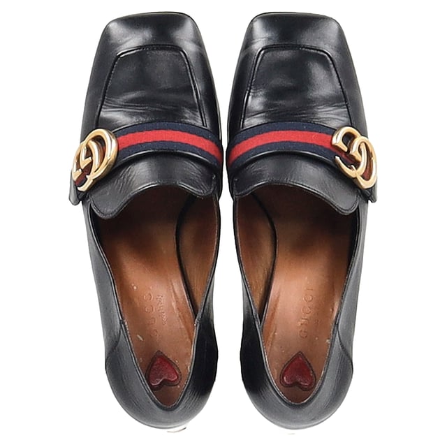 VINTAGE, RRP AS NEW
The Gucci GG Marmont Faux Pearl Detail Heeled Loafers in Black Leather combine classic elegance with a touch of modern sophistication, featuring the iconic GG logo and striking faux pearl embellishments. Crafted from premium black leather, these loafers offer a luxurious feel and a comfortable, structured fit. The small heel adds a subtle lift while maintaining all-day wearability, making them perfect for both work and casual outings. Pair them with tailored trousers and a sleek blouse for a polished, chic look that effortlessly blends style and comfort.
 
Gucci GG Marmont Faux Pearl Detail Heeled Loafers in Black Leather

Condition: Good
Signs of wear: Moderate signs of wear
Packaging: Box, Dust bag
Color: Black
Material: Leather | leather
Size: IT | 37
Measurements: Heel height: 70; Insole length: 245
SKU: NAPPUGBSH463771W
