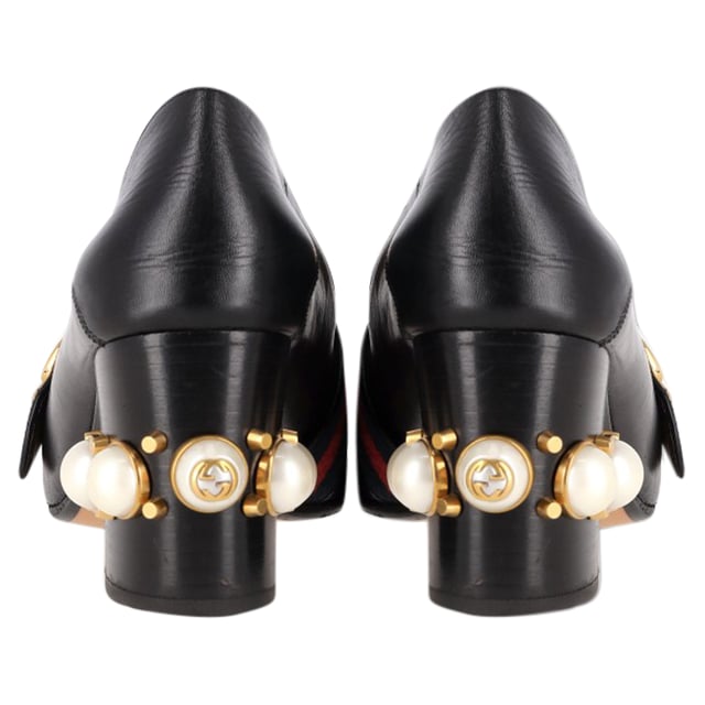 VINTAGE, RRP AS NEW
The Gucci GG Marmont Faux Pearl Detail Heeled Loafers in Black Leather combine classic elegance with a touch of modern sophistication, featuring the iconic GG logo and striking faux pearl embellishments. Crafted from premium black leather, these loafers offer a luxurious feel and a comfortable, structured fit. The small heel adds a subtle lift while maintaining all-day wearability, making them perfect for both work and casual outings. Pair them with tailored trousers and a sleek blouse for a polished, chic look that effortlessly blends style and comfort.
 
Gucci GG Marmont Faux Pearl Detail Heeled Loafers in Black Leather

Condition: Good
Signs of wear: Moderate signs of wear
Packaging: Box, Dust bag
Color: Black
Material: Leather | leather
Size: IT | 37
Measurements: Heel height: 70; Insole length: 245
SKU: NAPPUGBSH463771W