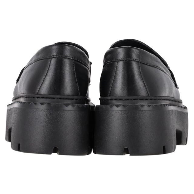 VINTAGE, RRP AS NEW
Step into refined luxury with the Jimmy Choo Bryer Flat Loafers in Black Leather. Crafted from buffed calfskin, these loafers offer a perfect blend of comfort and style. The round moc toe adds a classic touch, while the crystal-cut hardware at the vamp delivers a hint of sparkle and sophistication. The buffed calfskin lining ensures a smooth, luxurious feel, while the textured rubber platform midsole and treaded rubber outsole provide durability and traction. With a platform height of 1.75 inches, these loafers give you subtle lift without sacrificing comfort, making them ideal for both casual and more elevated looks.
with Dust bag

Jimmy Choo Bryer Flat Loafers in Black Leather
Condition: Excellent
Signs of wear: No visible sign of wear. No Mark at insole.,  Very light mark at soles.
Packaging: Dust bag
Color: black
Material: Leather | leather
Size: EU | 37
Measurements: Insole length: 280
SKU: NAPPUGBSH462131W