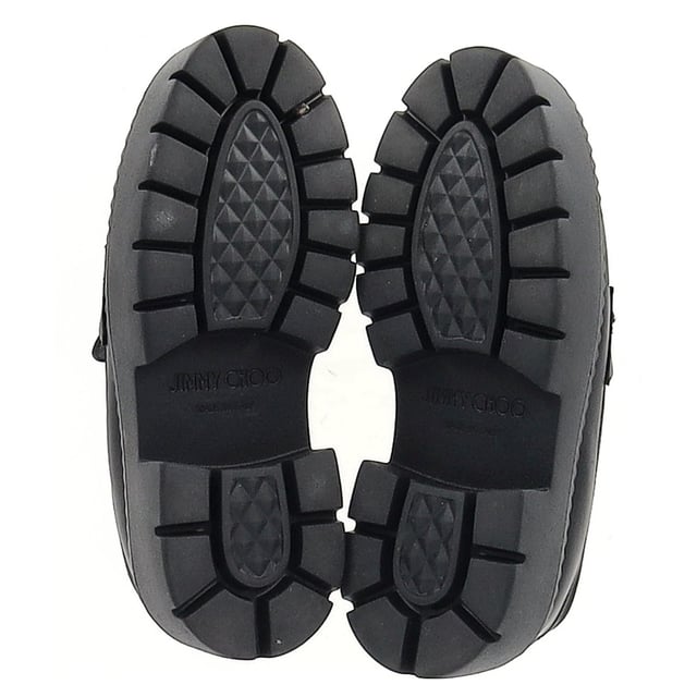 VINTAGE, RRP AS NEW
Step into refined luxury with the Jimmy Choo Bryer Flat Loafers in Black Leather. Crafted from buffed calfskin, these loafers offer a perfect blend of comfort and style. The round moc toe adds a classic touch, while the crystal-cut hardware at the vamp delivers a hint of sparkle and sophistication. The buffed calfskin lining ensures a smooth, luxurious feel, while the textured rubber platform midsole and treaded rubber outsole provide durability and traction. With a platform height of 1.75 inches, these loafers give you subtle lift without sacrificing comfort, making them ideal for both casual and more elevated looks.
with Dust bag

Jimmy Choo Bryer Flat Loafers in Black Leather
Condition: Excellent
Signs of wear: No visible sign of wear. No Mark at insole.,  Very light mark at soles.
Packaging: Dust bag
Color: black
Material: Leather | leather
Size: EU | 37
Measurements: Insole length: 280
SKU: NAPPUGBSH462131W