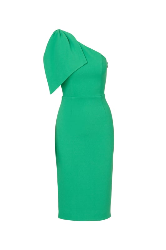 Own every room you walk into in this timeless midi dress. This chic dress features a one shoulder neckline, fitted body, and a mid-length skirt. Crafted from crepe fabric, this cocktail dress has a large bow accent at the shoulder. A zipper closure and slit at the centre back of this midi dress complete the design. Accessorize with your favourite heels and statement earrings for a look that will shine no matter the occasion.