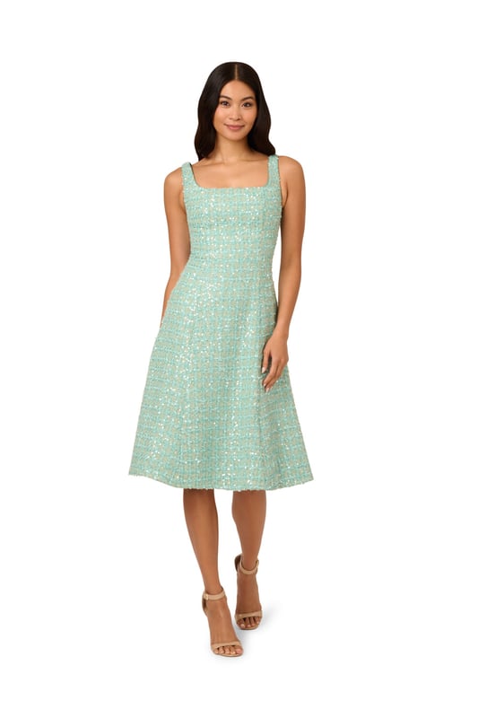 A square neckline and a fit-and-flare silhouette give this minty green womens midi dress a classic silhouette. The modern twist on the look is the pretty textured fabric. A tweed inspired boucle finished in sheer but shimmering sequins. The back zipper, princess seams, and a no-waist-seam construction give the bodice its sleek fit. Wear this cute sleeveless dress for a sparkly update on classic prim and polished style.