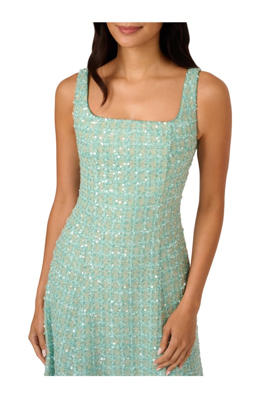 A square neckline and a fit-and-flare silhouette give this minty green womens midi dress a classic silhouette. The modern twist on the look is the pretty textured fabric. A tweed inspired boucle finished in sheer but shimmering sequins. The back zipper, princess seams, and a no-waist-seam construction give the bodice its sleek fit. Wear this cute sleeveless dress for a sparkly update on classic prim and polished style.