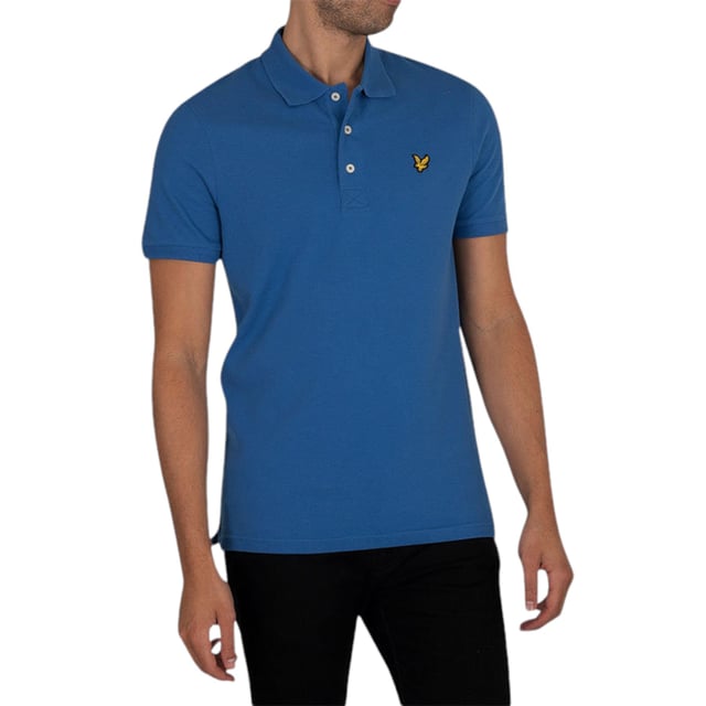 Style Code: SP400VOG
Made in India
97% Cotton, 3% Elastane
Regular Fit
Iconic Eagle Logo at Chest
Made From Pique Cotton
Three Button Front Placket
Ribbed Hem and Cuffs
Branded Buttons
Short Sleeve
Premium Quality
Machine Wash (According to Instructions on Care Label)