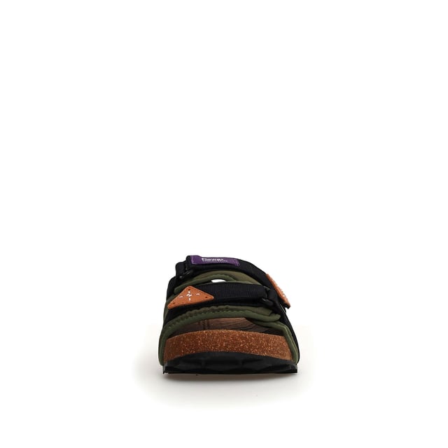 Slide sandals with adjustable straps and a durable technical nylon fabric band. Anatomical cork insole with superior moisture absorption and antibacterial properties for all-day comfort. Non-slip rubber sole ensures stability and durability.