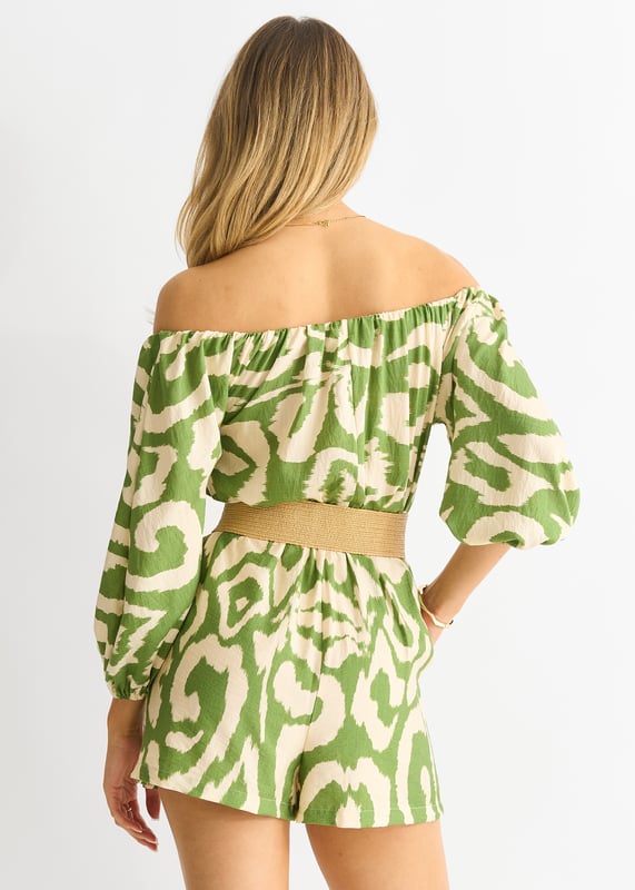 Dress to impress in our Green Abstract Belted Bardot Viscose Playsuit. Featuring an eye-catching abstract design and a flattering belted waist, this playsuit is perfect for any special occasion. Made with soft and lightweight viscose fabric, you'll feel comfortable and elegant all day or night.